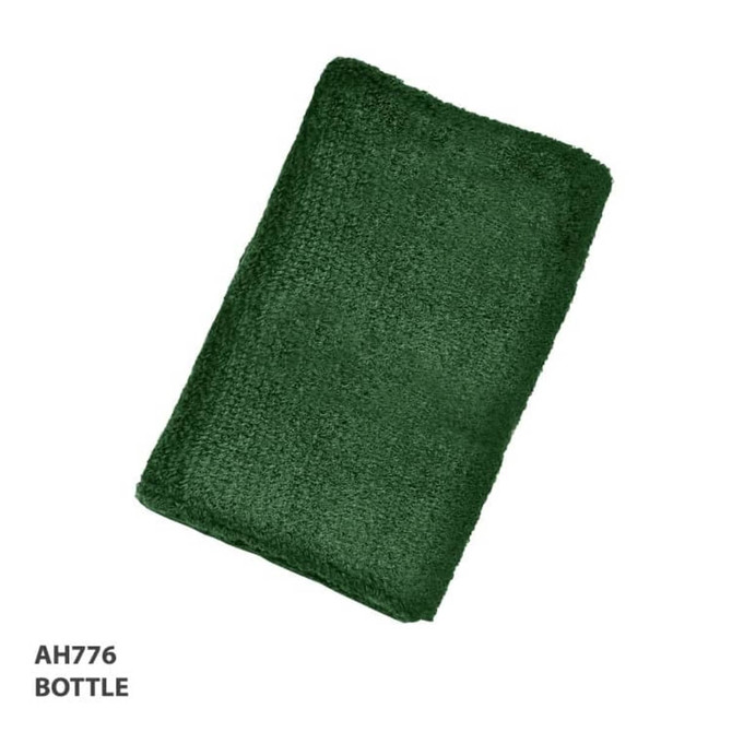 A green wristband made of soft material, featuring a logo or branding.