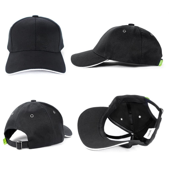 A black organic cotton sandwich cap with a white accent. It features a logo and has adjustable sizing at the back.