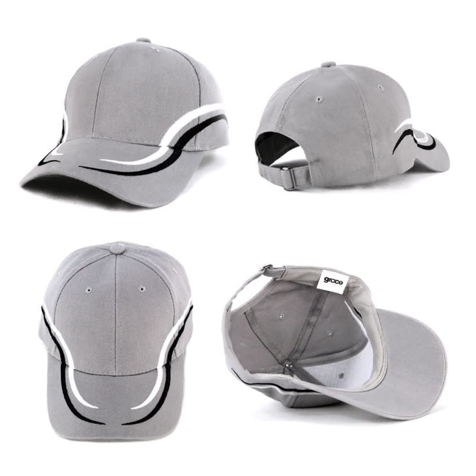 A grey cap with white and black detailing, featuring a curved design and a strap at the back. It has a logo.