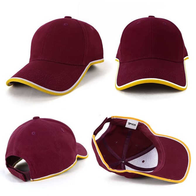 A burgundy cap with a yellow trim and a small logo, featuring a classic baseball style design.