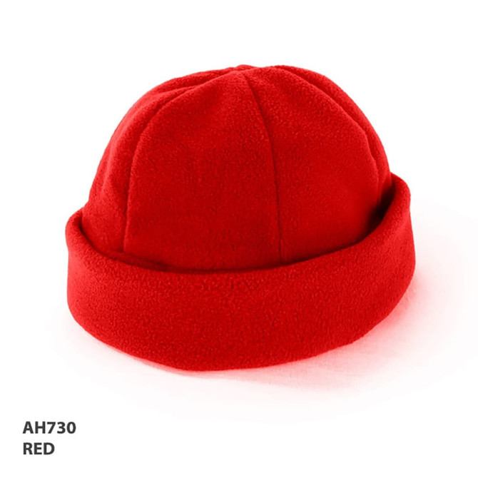 A bright red polar fleece beanie with a rolled cuff and a logo present on the side. 