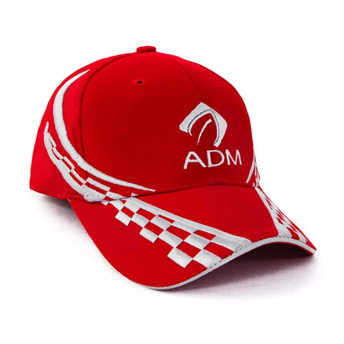 A red cap featuring a white logo and checkered pattern on the brim.