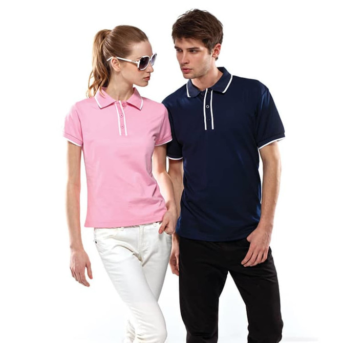 Two models wear "Blade Polos" in pink and navy blue, featuring contrasting trims and a logo on the polo shirts.