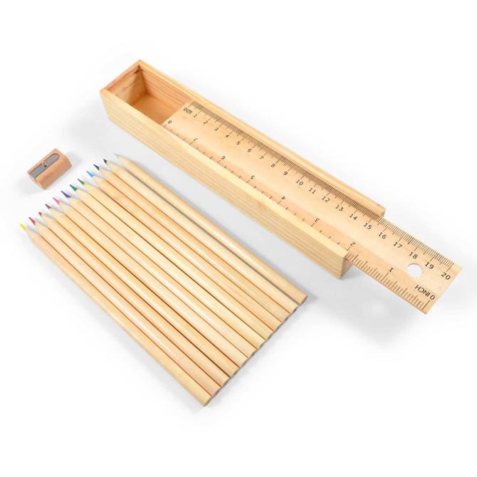 A set of wooden coloured pencils in various colors, a sharpener, and a measuring ruler all in a wooden box.