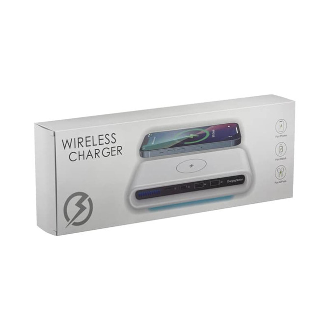 A wireless charging station in white packaging features a phone on top and has a logo on the front.