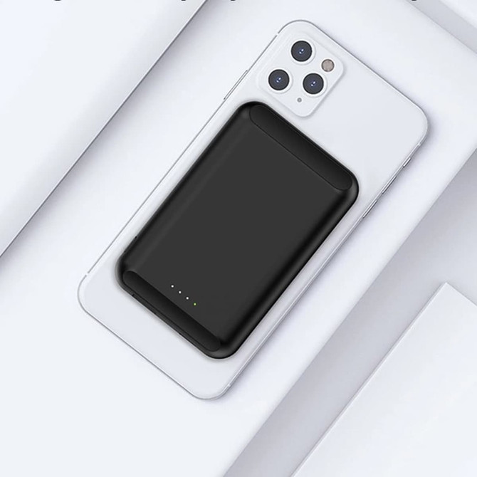 A black magnetic wireless power bank positioned on a white smartphone, featuring a sleek design and logo.