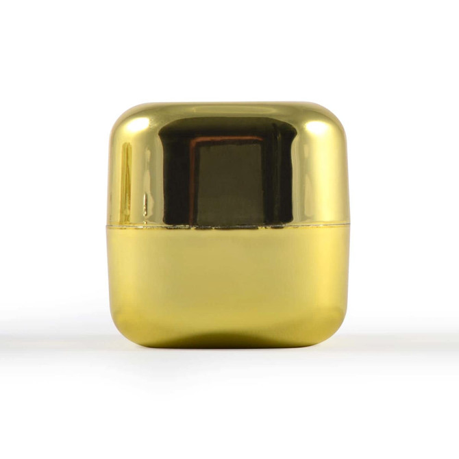 A gold-colored cube-shaped container of Ritz Cube Lip Balm, designed for health and personal care.