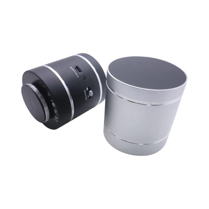 A black and silver vibration speaker featuring a sleek cylindrical design and simple control buttons.