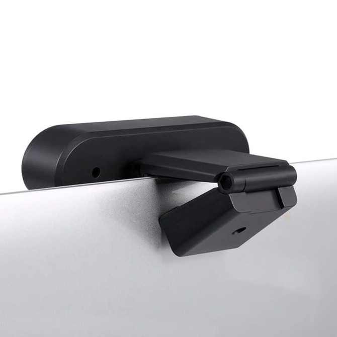 A black webcam camera with a mounting clip, designed for attachment to a computer monitor or laptop.