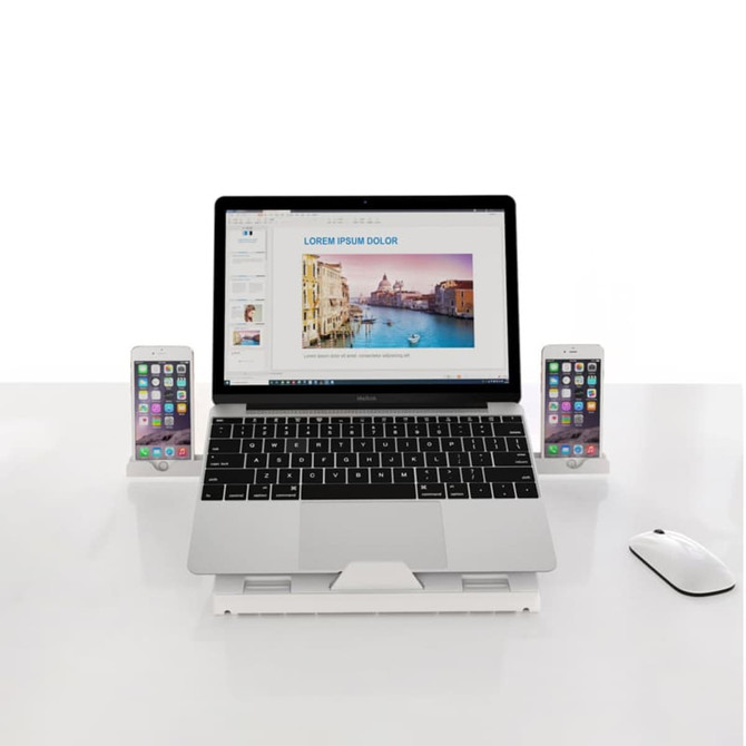 A foldable laptop stand in white, supporting a laptop and two smartphones, featuring a sleek design.