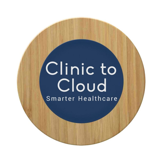 A round bamboo wireless charger featuring a dark circular centre with text and a light wooden outer edge.