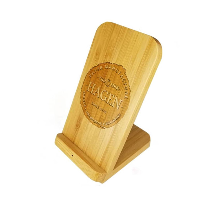 A bamboo wireless charger stand with a circular logo. The design features a smooth, natural finish.