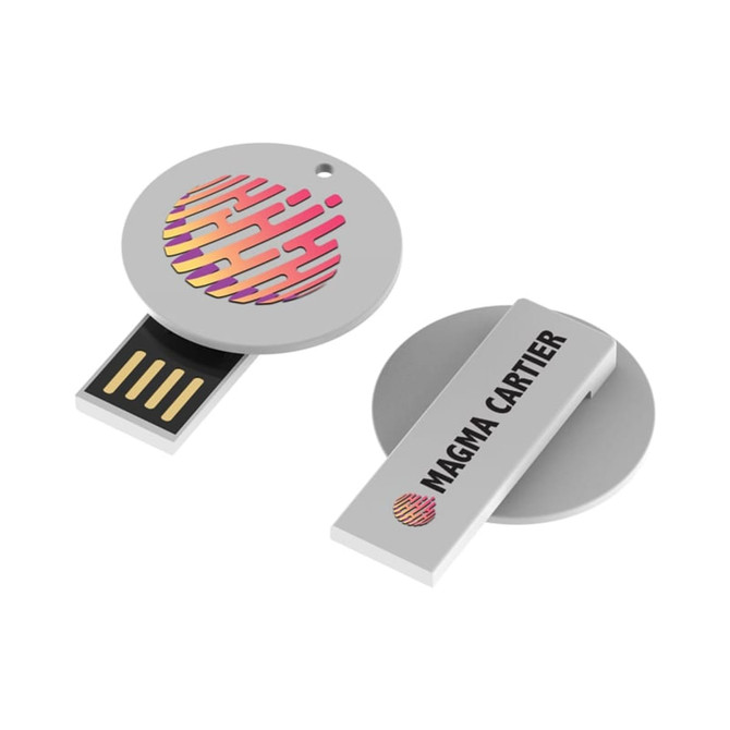 A silver flash drive with a circular design features a vibrant logo and a retractable USB connector.