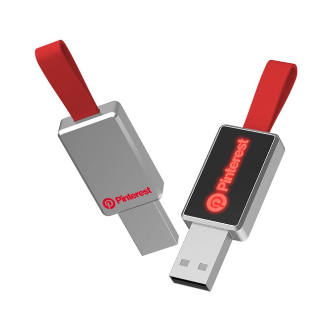 A silver USB flash drive with a red strap and a logo on one side.