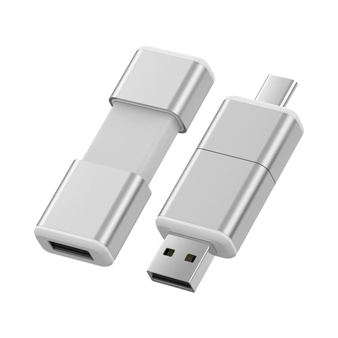 A silver Type-C flash drive with a retractable design, featuring a logo on one side.