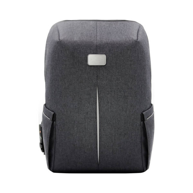 A grey backpack with a sleek design, featuring side pockets and a logo.