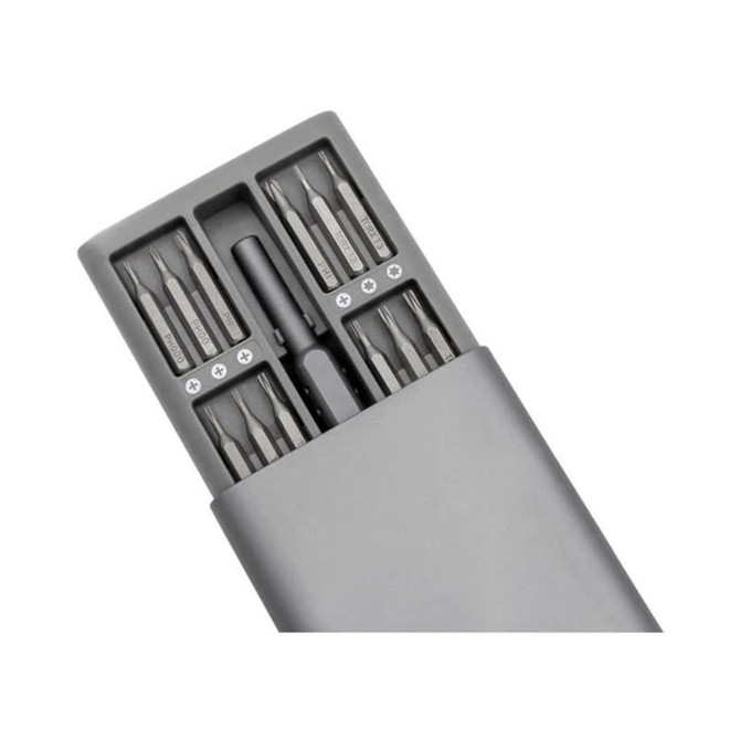A grey precision tool kit with various screwdriver bits and a holder, featuring a sleek, compact design.