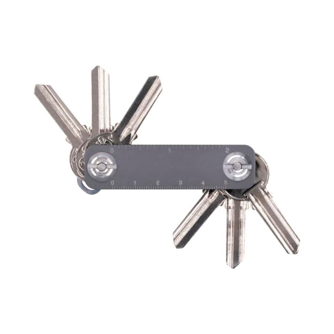 A keyring organiser featuring multiple silver keys and a clear measurement ruler. It has a simple, sleek design.