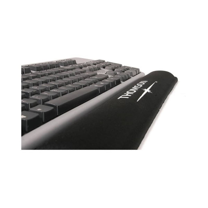 A black gel keyboard wrist rest positioned in front of a black keyboard, featuring a logo on the surface.