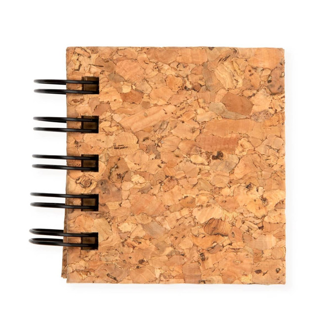 A set of Codex Cork Sticky Notes featuring a natural cork exterior and a spiral binding.