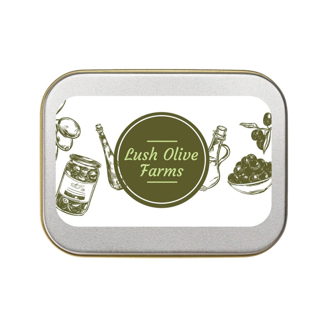 A silver rectangular tin labeled "Lush Olive Farms" featuring illustrations of various bottles and olives.