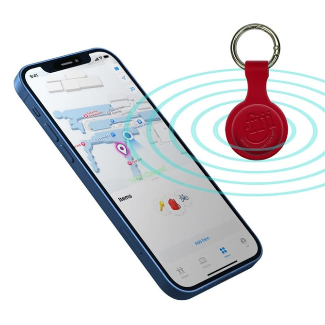 A red silicone Airtag case next to a smartphone displaying a map, featuring location tracking.