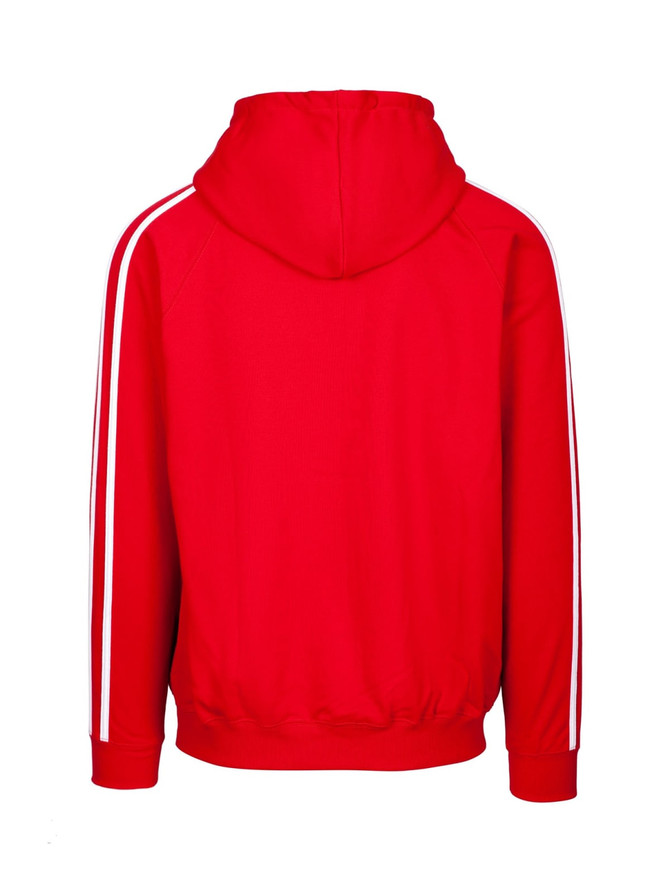 A red unbrushed hoodie featuring white stripe sleeves and a hood, with branding on the back.