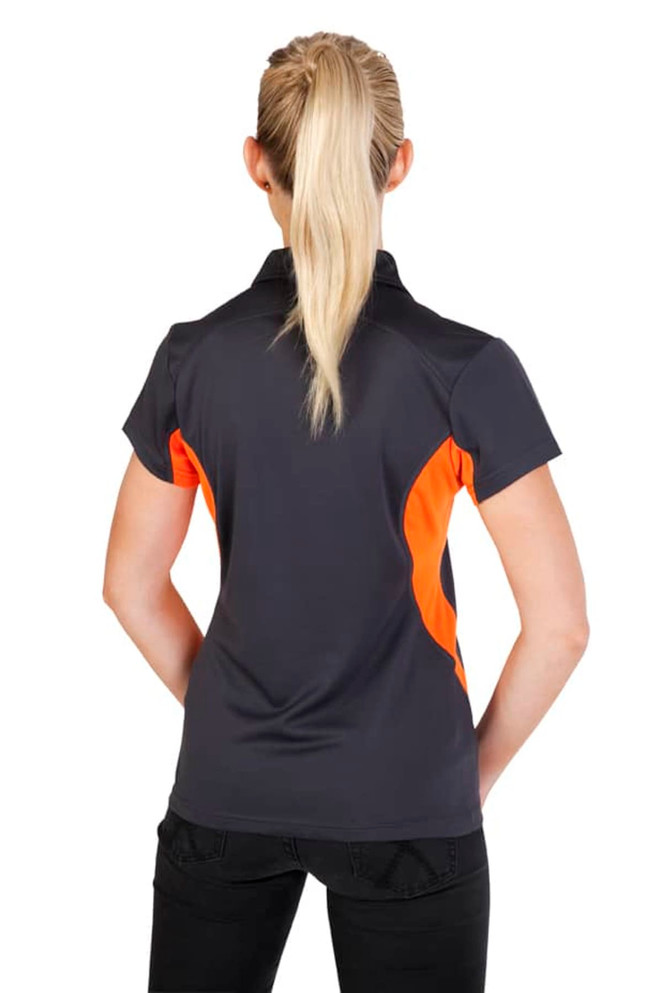 A women's polo shirt in dark grey with orange accents, featuring a logo on the back.