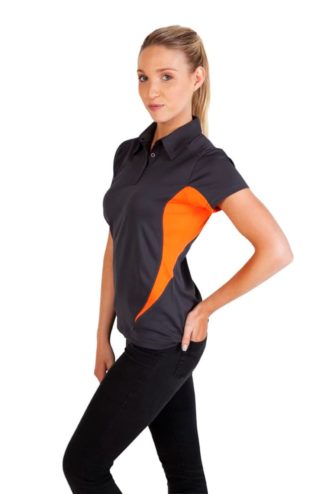 A women's polyester polo shirt in grey with vibrant orange accents, featuring a logo on the chest.