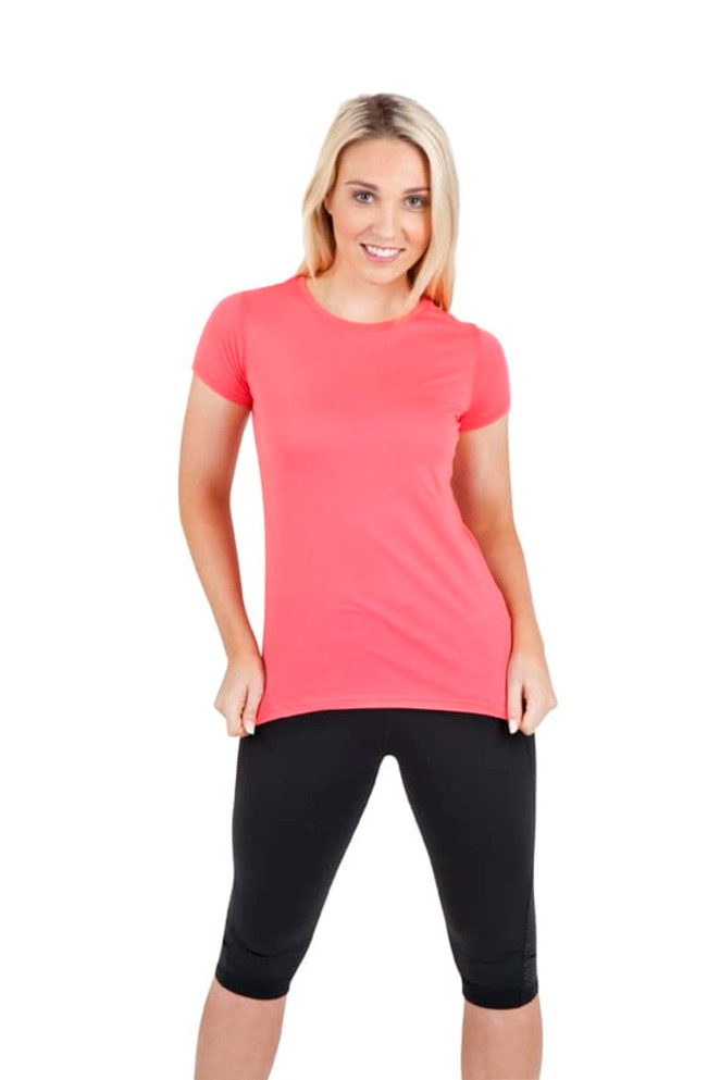 A short-sleeved women's T-shirt in vibrant coral, paired with black leggings, featuring a logo on the shirt.