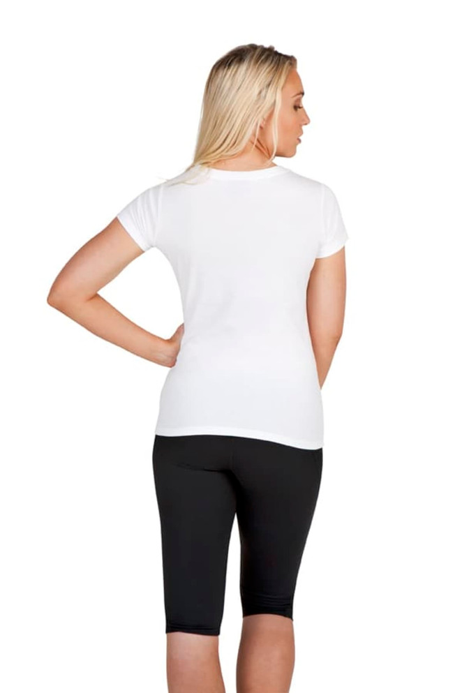 A white women's slim fit tee is displayed on a model, paired with black leggings, showcasing the back view of the top.