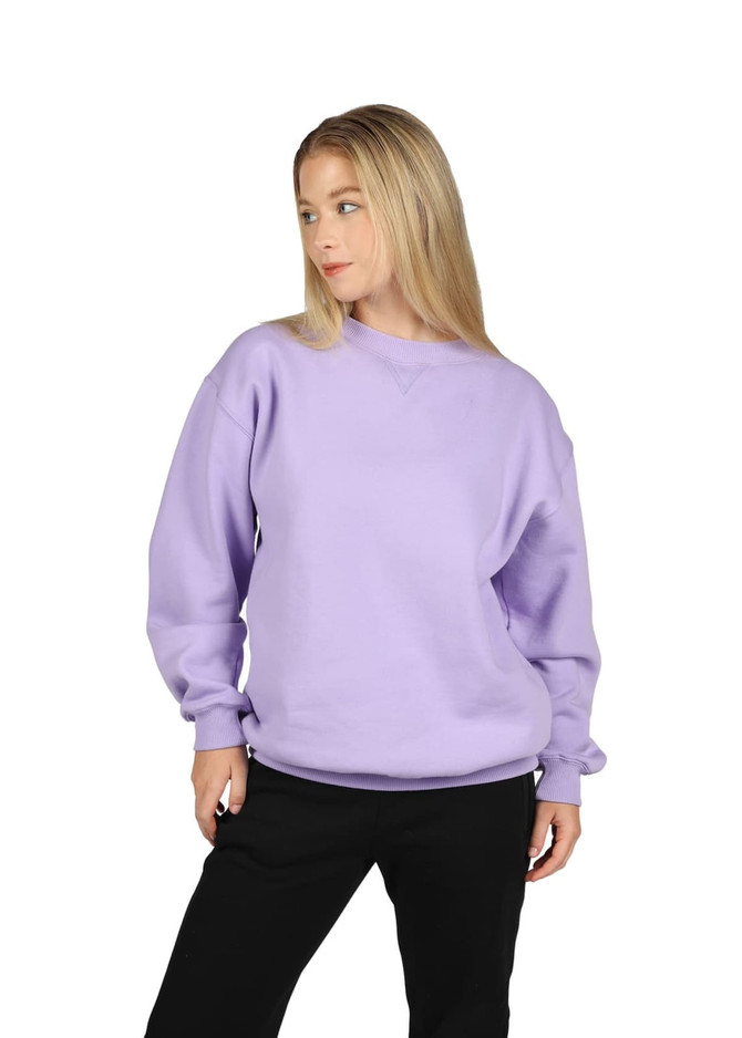 A woman wearing a light purple poly cotton fleece jumper with a relaxed fit. The jumper features a logo.