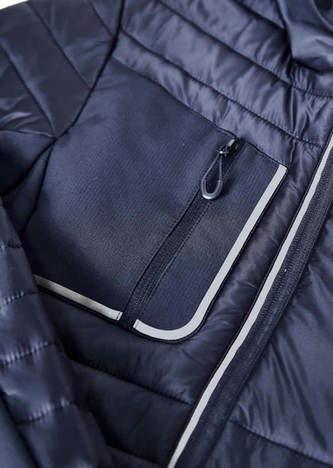 A navy blue unisex patrol jacket featuring a zippered pocket and a textured fabric design.