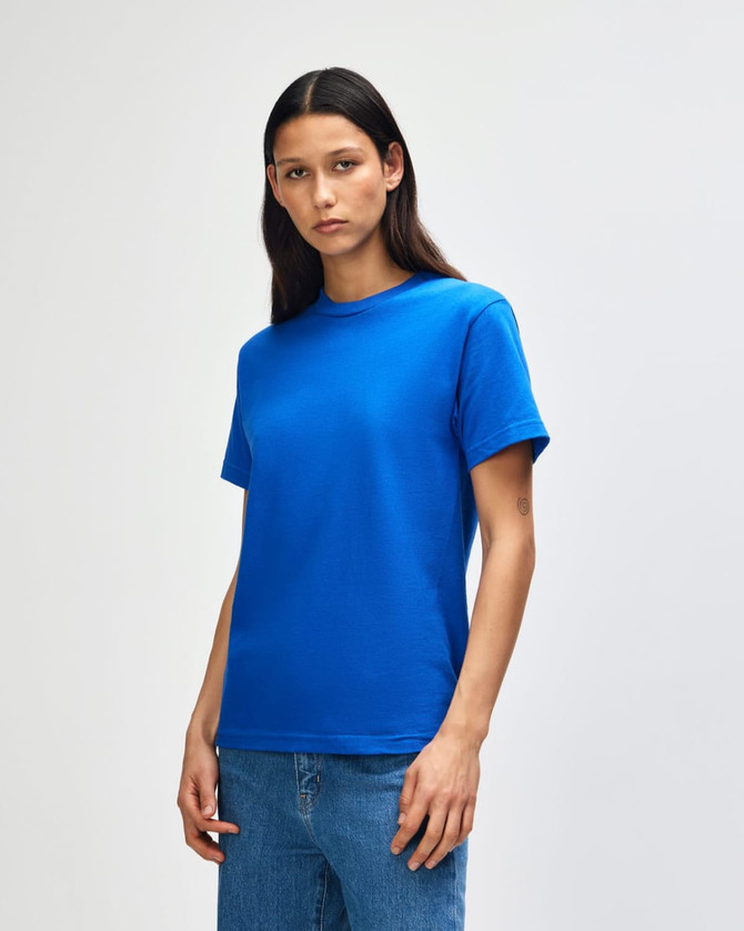 A unisex heavyweight cotton t-shirt in a vibrant blue colour, featuring a simple design and short sleeves.