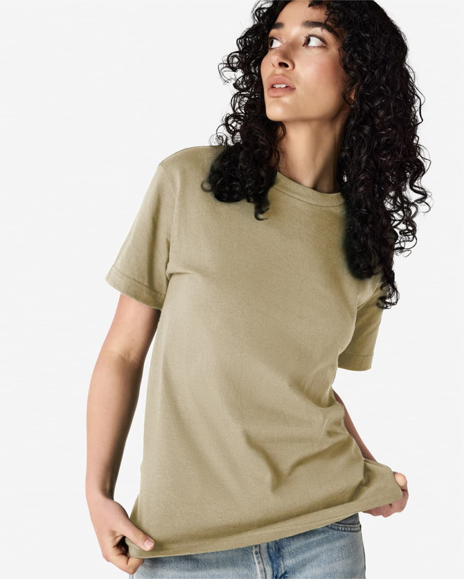 A heavyweight cotton unisex t-shirt in khaki, featuring short sleeves and a relaxed fit. It has a logo.