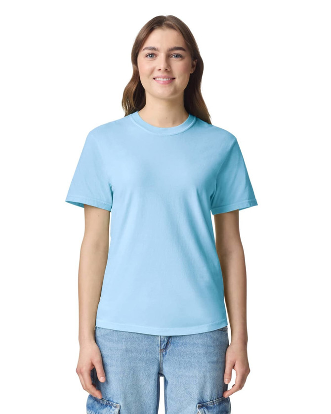 A light blue heavyweight t-shirt, featuring a round neckline and short sleeves, displayed on a model.