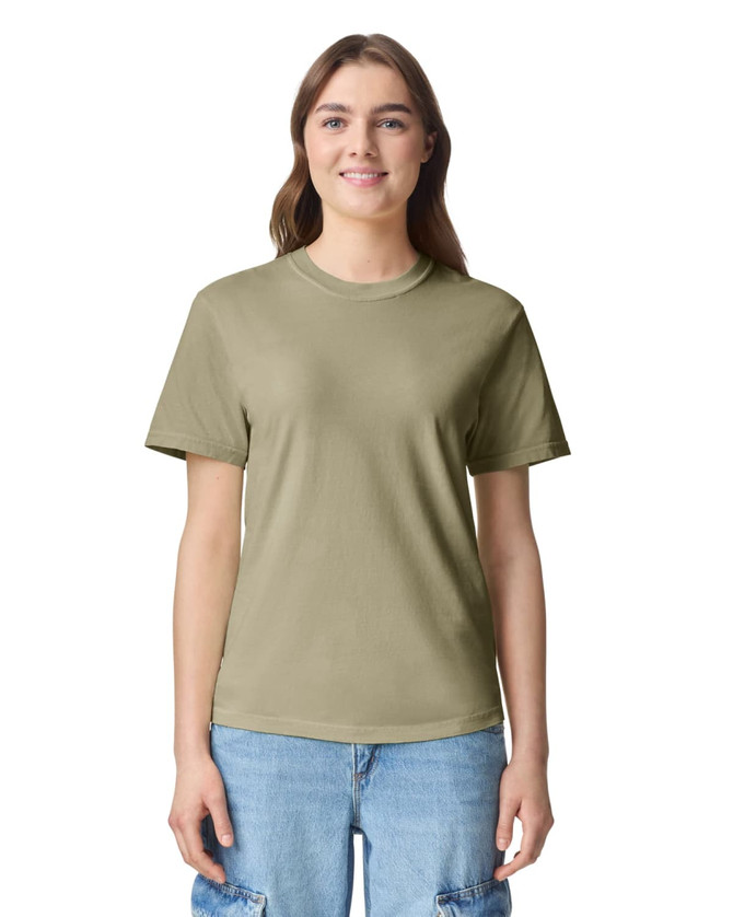 A lightweight olive green adult heavyweight t-shirt with a round neck and short sleeves. The shirt features a logo.