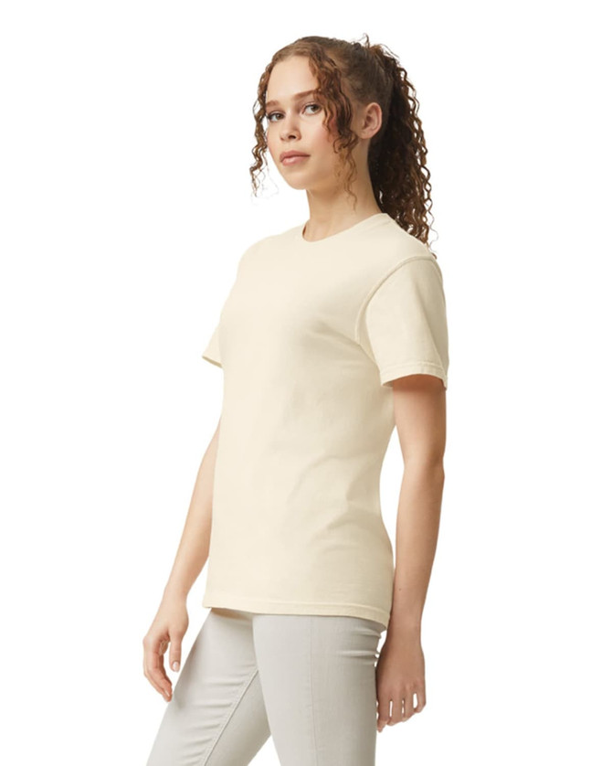 A light beige heavyweight T-shirt with short sleeves, featuring a subtle logo.