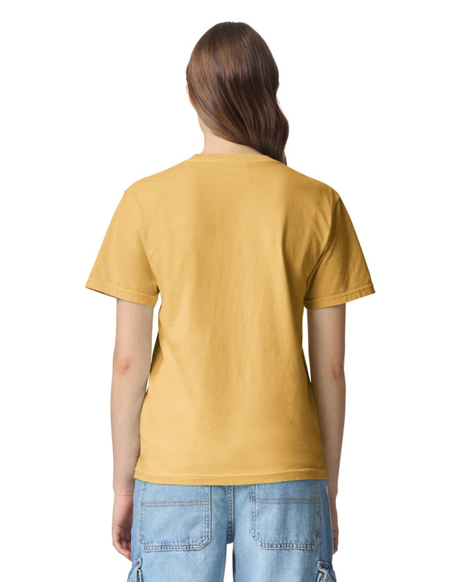 A back view of a yellow heavyweight adult T-shirt. The shirt has a simple design and is worn with casual blue shorts.