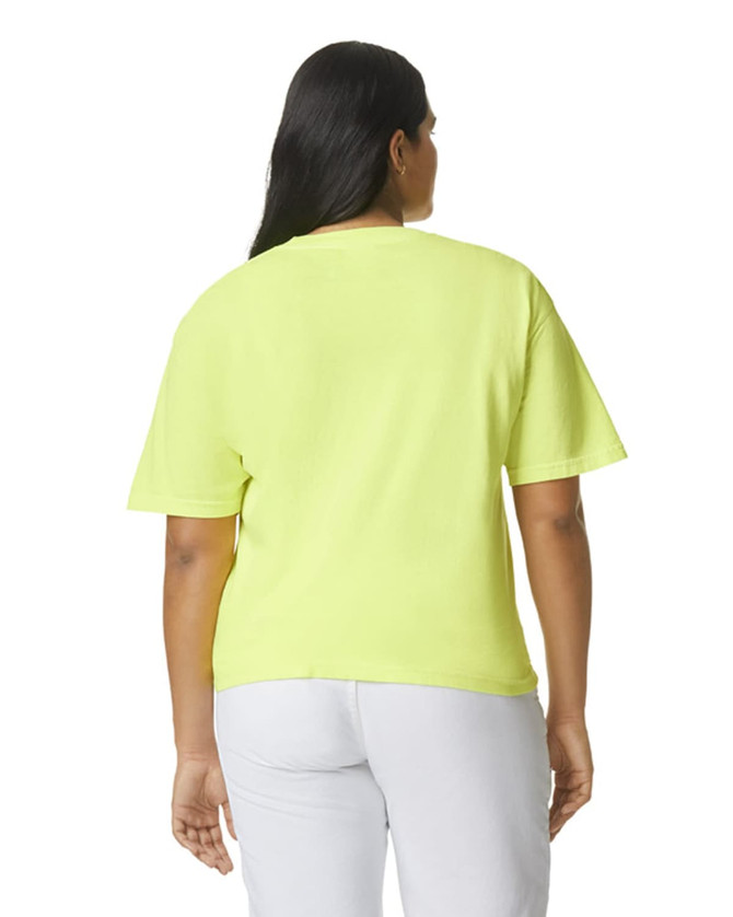 A bright yellow heavyweight t-shirt with short sleeves and a relaxed fit, featuring a logo on the back.