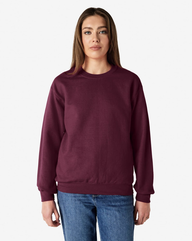 A burgundy Gildan Heavy Blend adult crewneck sweatshirt featuring a simple design and a logo.