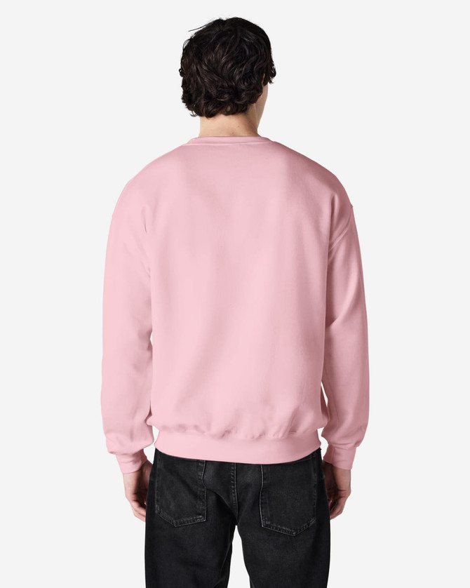 A pink Gildan Heavy Blend adult crewneck sweatshirt viewed from the back, featuring a simple design and a logo.