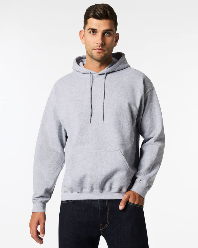 A grey hooded sweatshirt featuring a front pocket and a drawstring hood, modelled by a person.