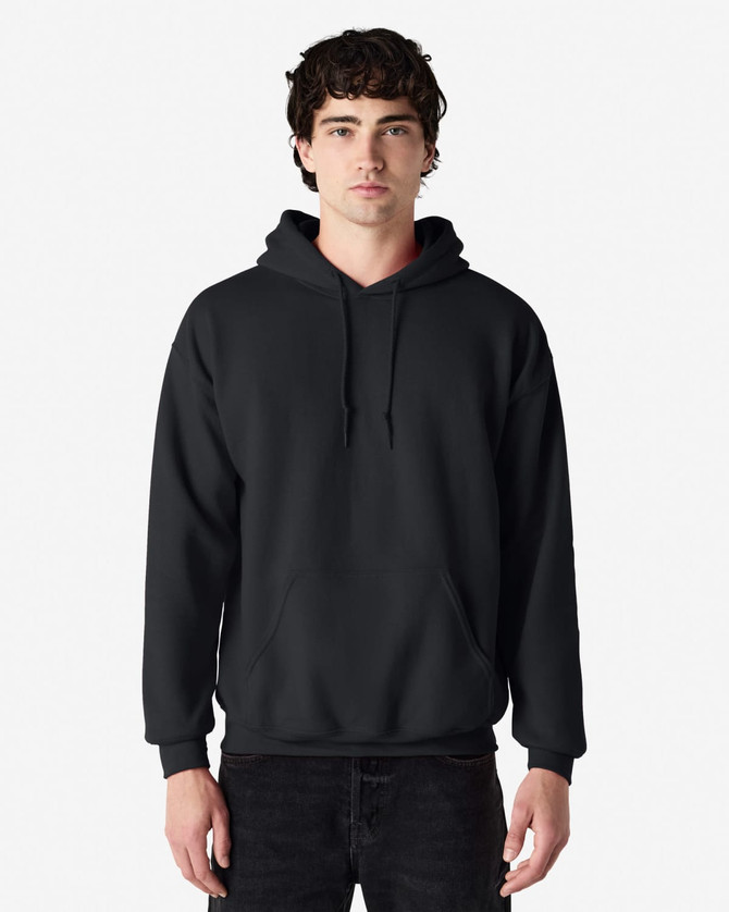 A dark grey Gildan Heavy Blend adult hooded sweatshirt displayed on a model with a neutral background.