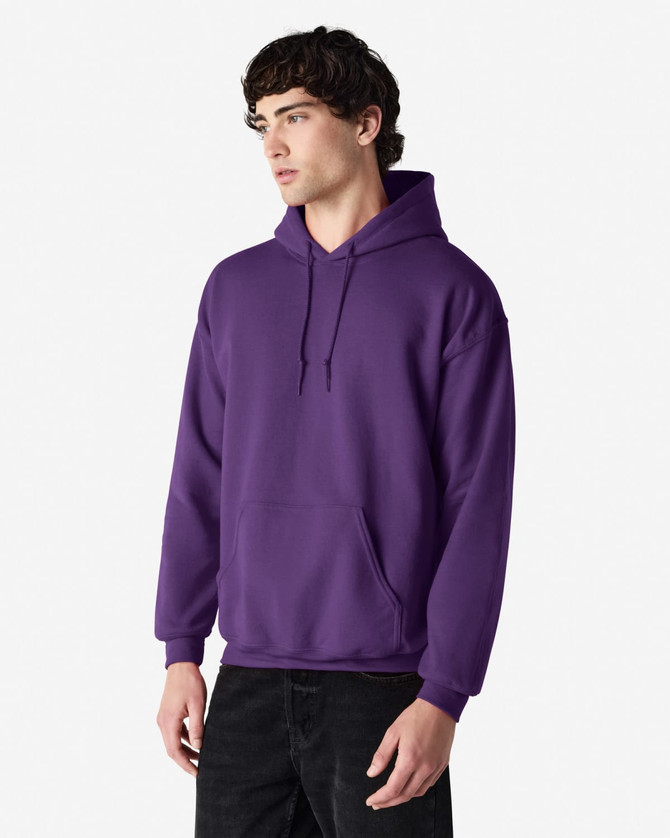 A purple Gildan Heavy Blend adult hooded sweatshirt with a front pocket and a large hood.