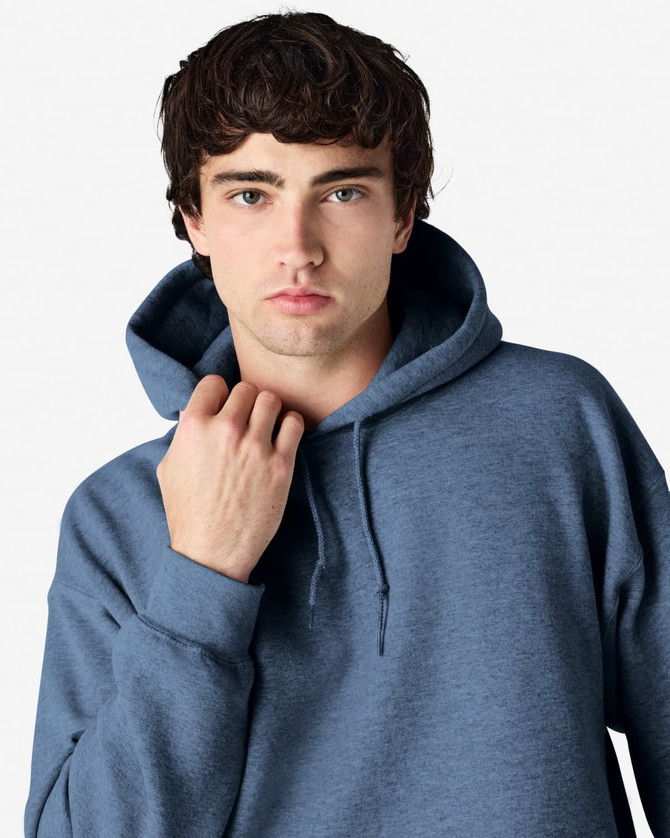 A blue Gildan Heavy Blend adult hooded sweatshirt with a drawstring hood and a subtle logo.
