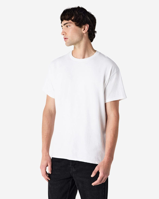A white Gildan Ultra Cotton adult t-shirt displayed on a male model, featuring a logo on the front.