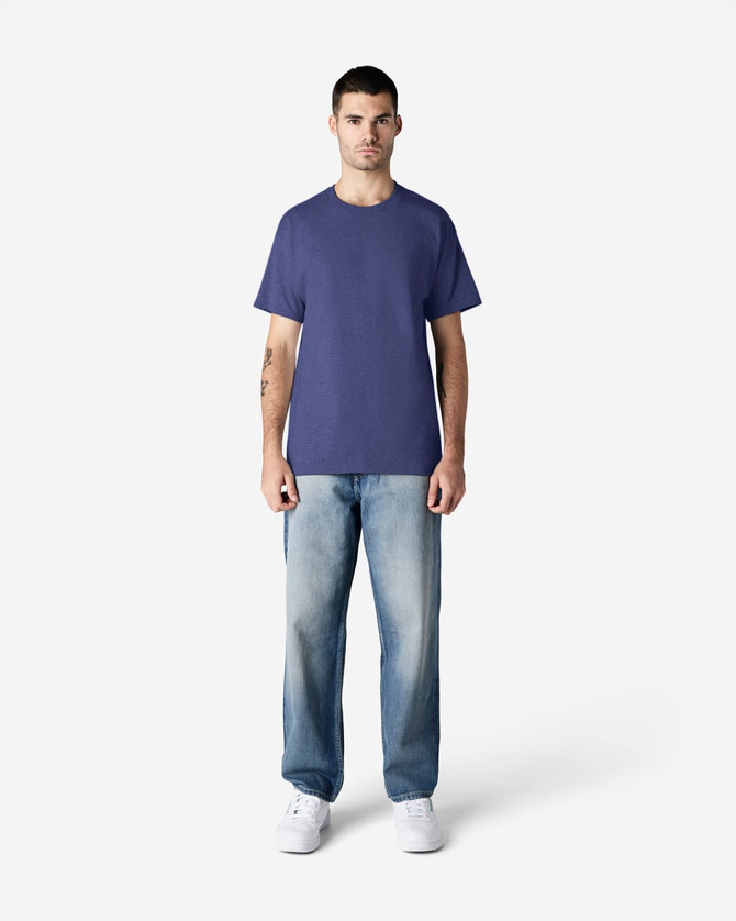 A purple Gildan Ultra Cotton adult t-shirt displayed on a model wearing light blue jeans and white shoes.
