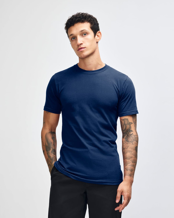 A unisex short sleeve t-shirt in navy blue, featuring a plain design and a logo.