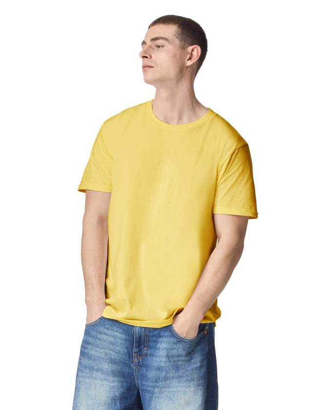Unisex fine jersey short sleeve t-shirt in vibrant yellow, modelled by a person wearing blue jeans. Features a logo.